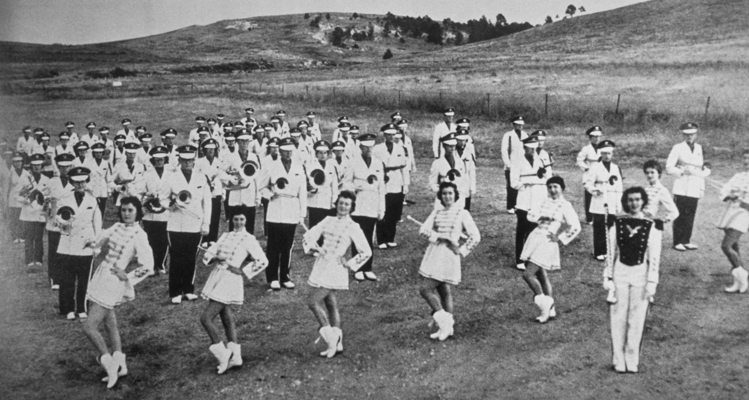 Marching band performing in formation