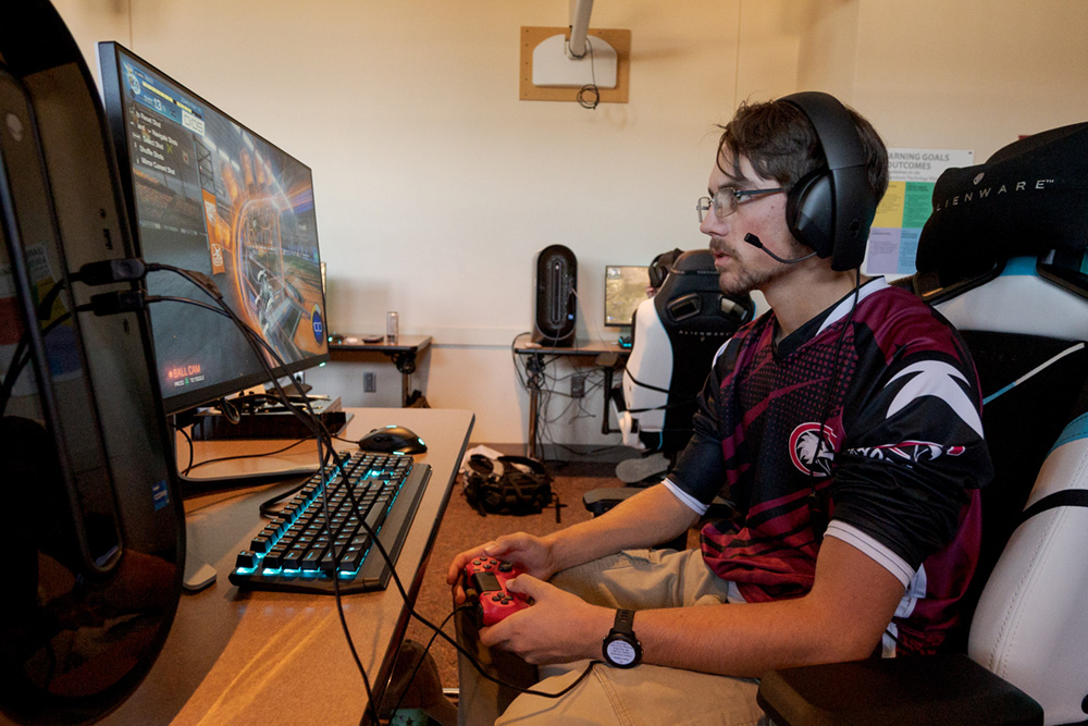 Student playing game at computer