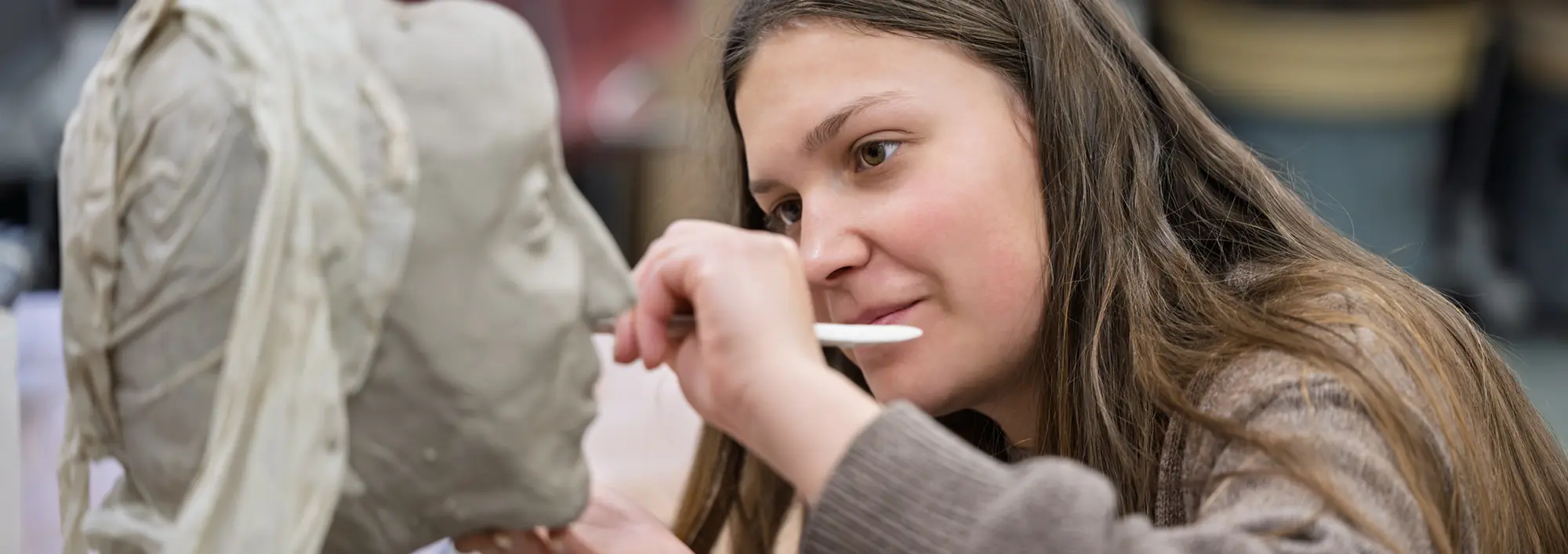 Student working on a sculpture project