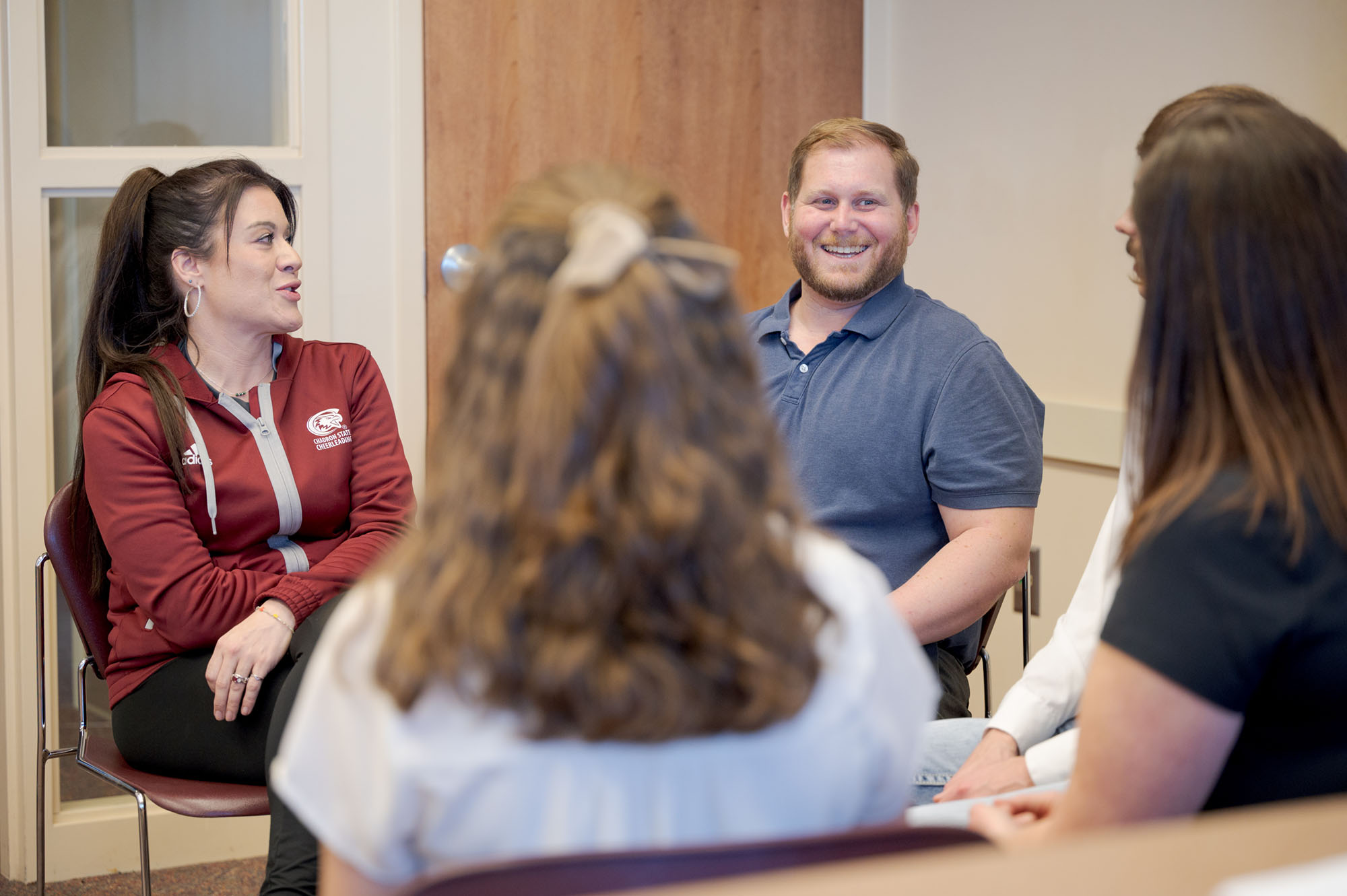 Counseling students work on a project