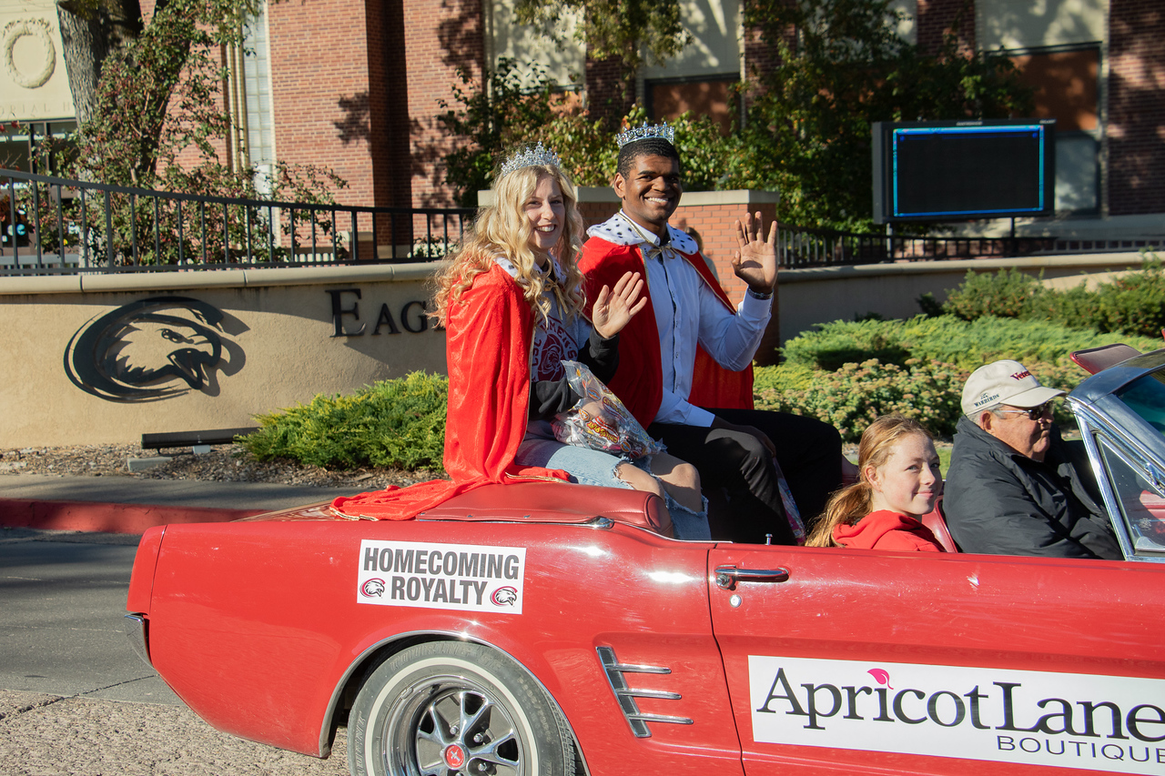 Homecoming Royalty 2023 riding in the parade