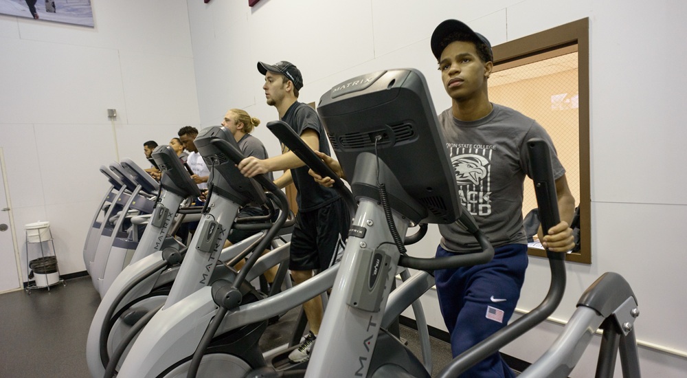 Students exercising on machines