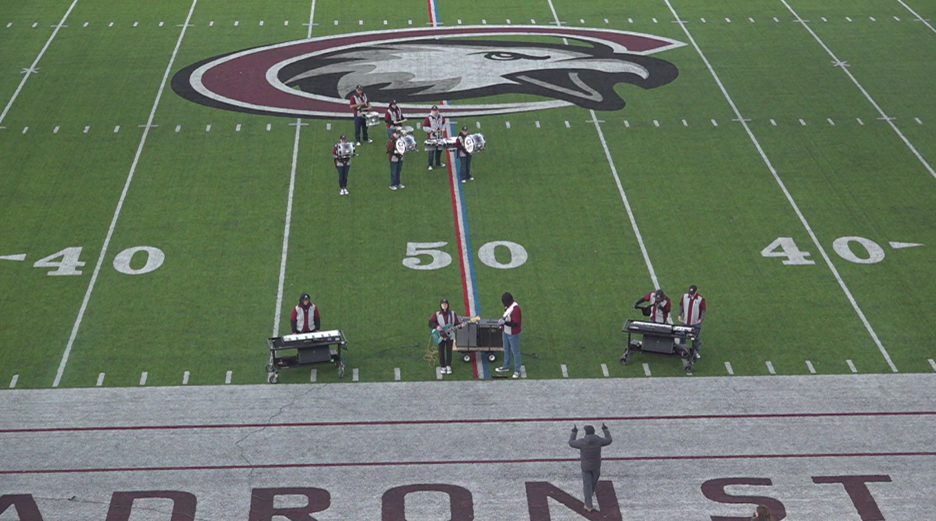 Image of drum line on field