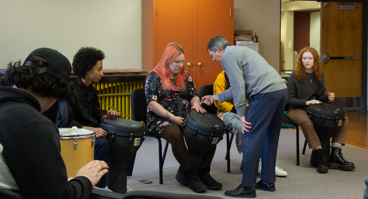 students playing hand drums