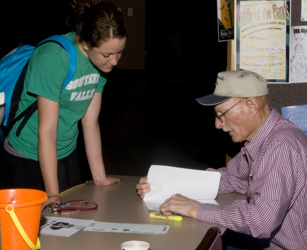 Del Hussey registers freshman Jessie Sadd for the election.