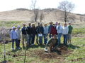 Arboretum volunteers pose after planting 100 trees