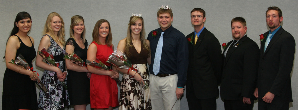 Ashley Nutsch and Adam Rasmussen, are flanked by members of their court, Victoria Barraza, Paige Bosch, Lauren Emory, Kortany Schultz, Douglas Liewer, Chedric Monahan and Alex Adden