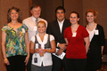 The group that organized the conference poses for a photo