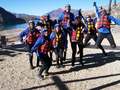 Ashley Maxon and Jacob Zitterkopf with others white water rafting