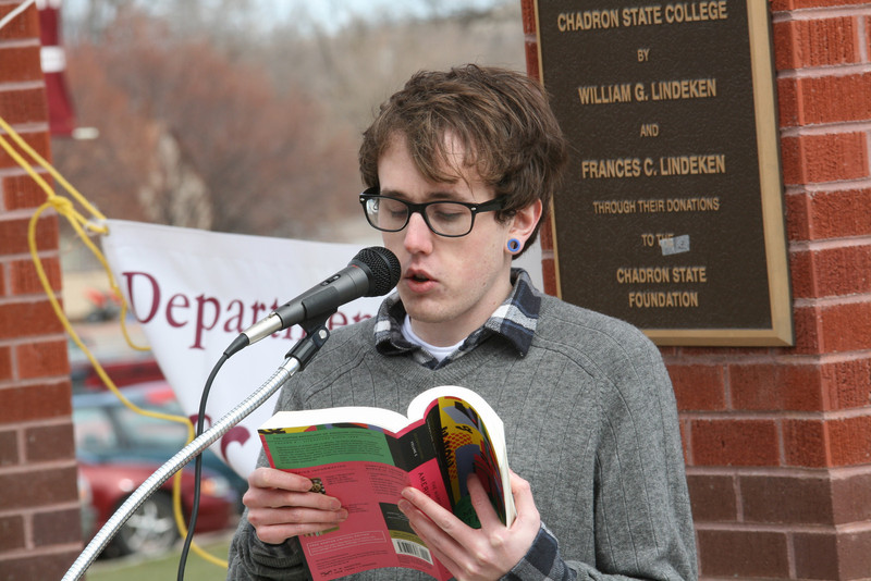 Chadron State College sophomore Nick Miller of Alliance reads Allen Ginsberg's