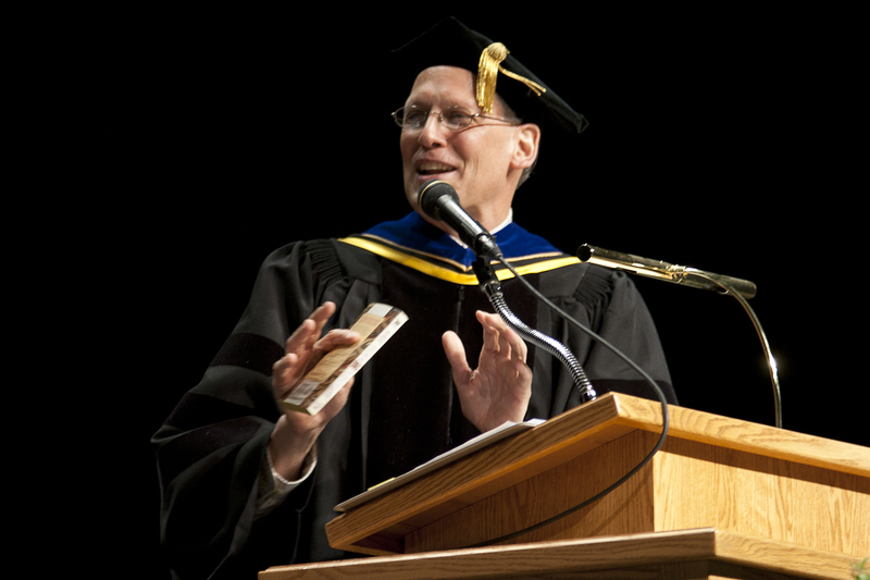 Dr. Jay Sutliffe shares a laugh while serving as faculty greeter.