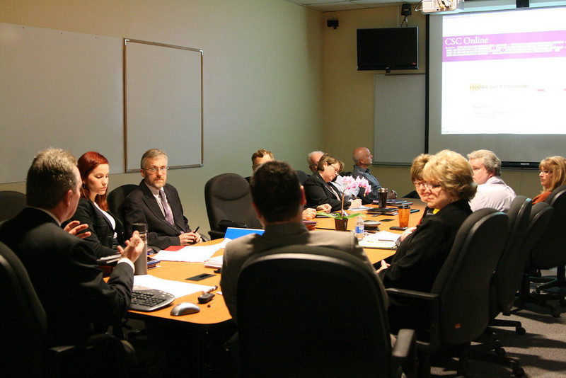 Members of the Chadron State College business faculty meet with Ewa Swiadkowska Andrezj Sygula.