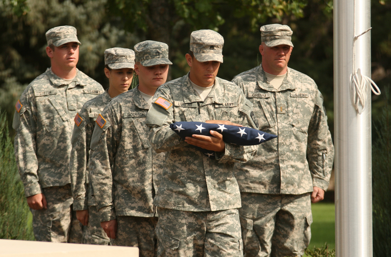 Chadron State College ROTC cadets carry the flag to be raised during the 9/11 remembrance ceremony on campus.