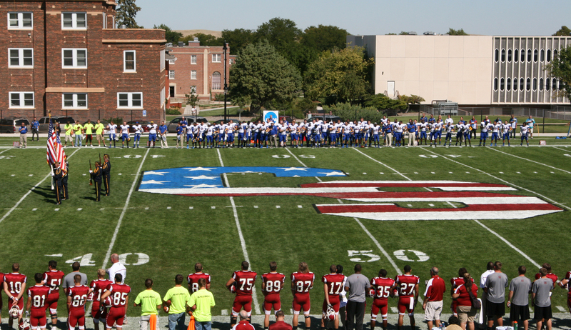 The Chadron Veterans Honor Guard presents the flag prior to Chadron State College's game.