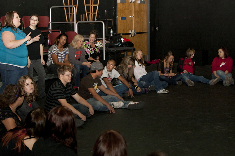 Chadron State College student Shalee Jones leads high school students in an elaborate game of Duck, Duck, Goose.