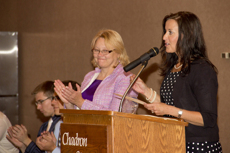 Dr. Twila Fickel and Jill Mack give recognition to the Chadron State College health sciences students who have been accepted to professional schools. (Photo by Justin Haag)