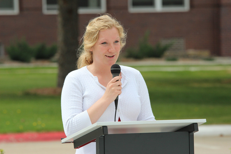 Tiffani Roelle, the Chadron State College Centennial Time Capsule committee coordinator, speaks during the item's dedication ceremony April 26. (Photo by Justin Haag)