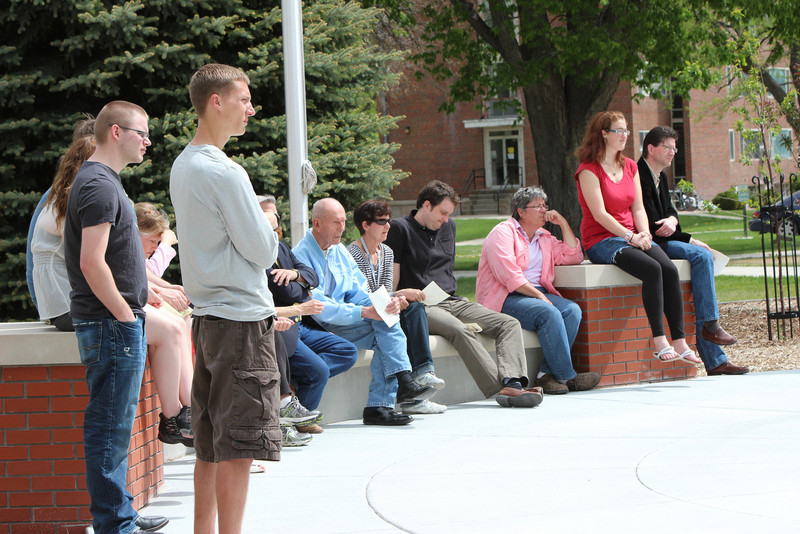 Those attending the Chadron State College Centennial Time Capsule Dedication Ceremony listen as Con Marshall delivers the event's keynote address. (Photo by Justin Haag)