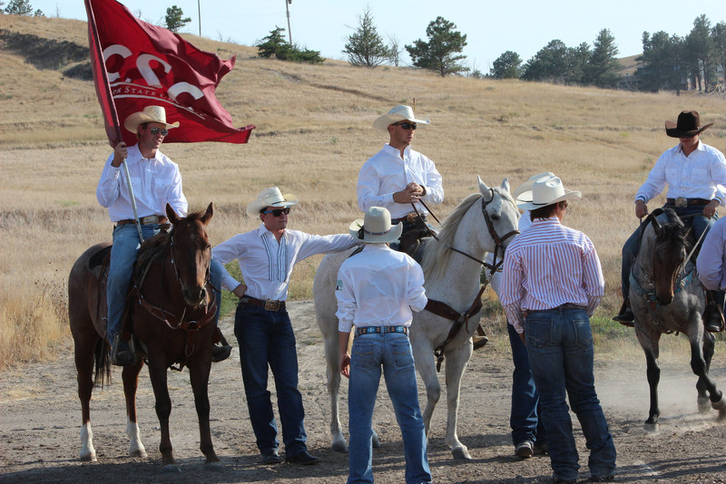 Members of the Chadron State College rodeo club wait for the ceremony to begin. (Photo by Justin Haag)