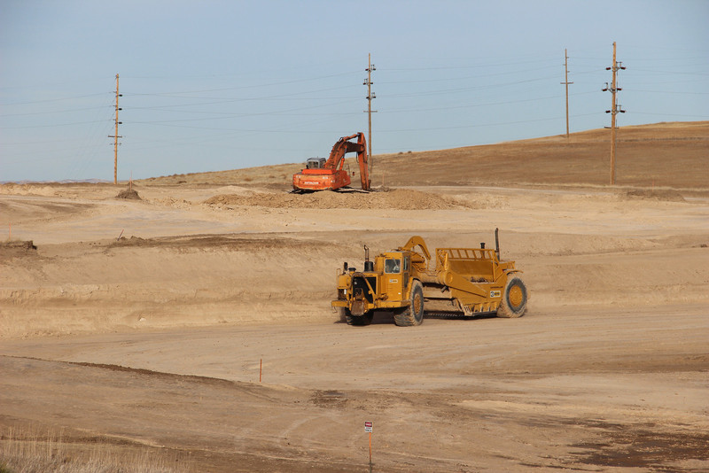 Workers of Sampson Construction move dirt at the site of future Rangeland Complex at Chadron State College on Dec. 5. (Photo by Justin Haag)