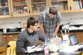 Curtis Perriotte-Olson and Corey Paz look at plates