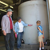 Steve Rolfsmeier and his son learn about the rain catch system
