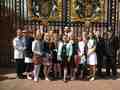 CSC justice studies majors pose outside of Buckingham Palace