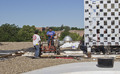 Roofing crews replace Kent Hall roof