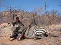 Tomilyn Trask with the zebra she shot