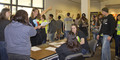 Mary Donahue directs participants