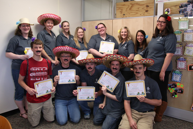 Returning tutors and Supplemental Instruction leaders pose at the Cinco de Mayo celebration in their honor at the Learning Center in the King Library Tuesday.