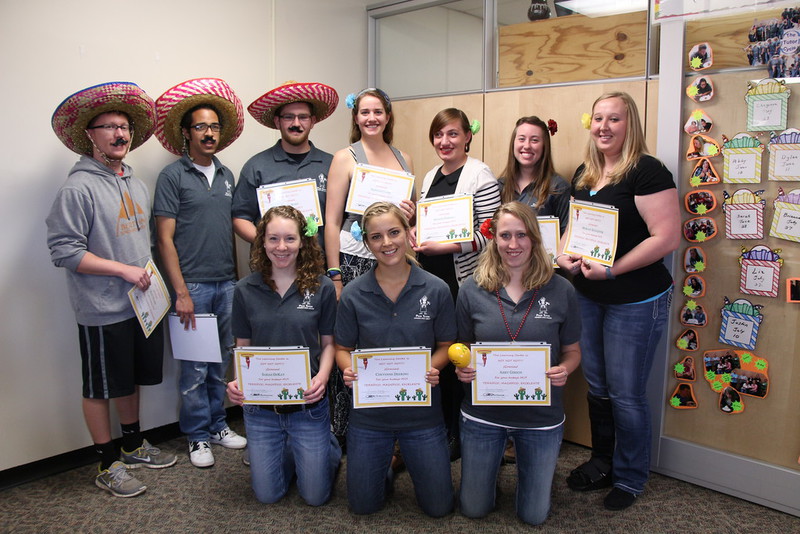 Graduating and non-returning tutors and Supplemental Instruction leaders pose at the Cinco de Mayo celebration