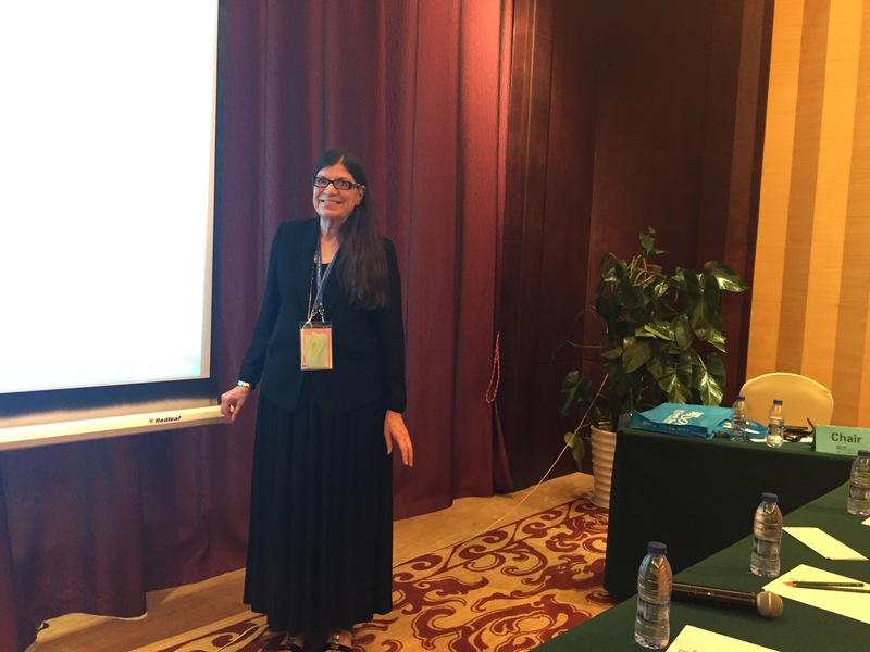 Laura Gaudet poses for a photo in China during her conference.