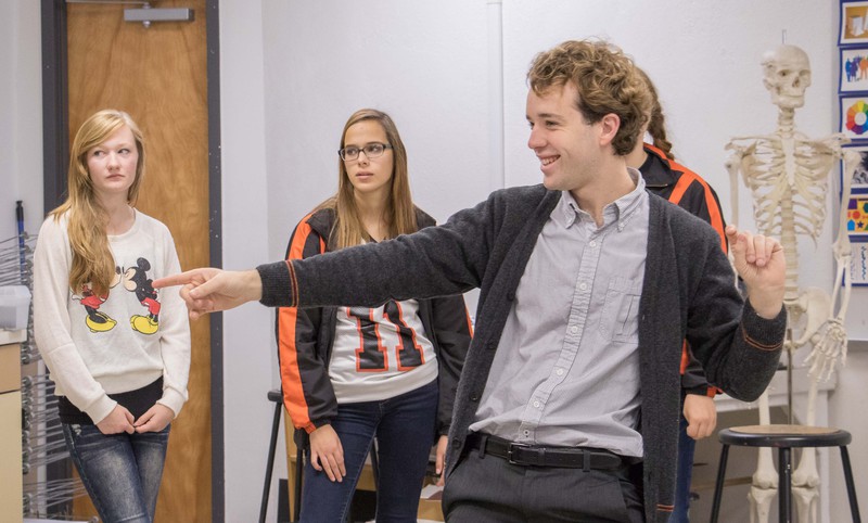 Theatre major Derek Phelps presents information during a Shakespeare workshop
