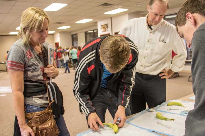 J.T. Engberg practices suturing a banana.