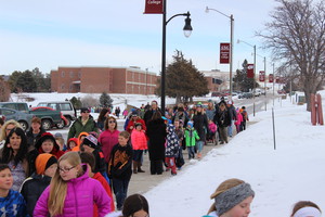 Participants march on campus during the MLK march
