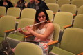 Messina Maley practices her flute