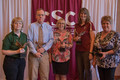Employees recognized for 20 years of service pose for a photo