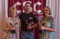 Employees recognized for 30 years pose for a photo