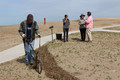Dewayne Gimeson uses an antique cultivator