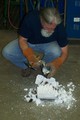 Rod Clause breaks open a plaster mold