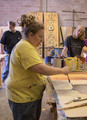 Amy Campion demonstrates set painting to students