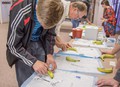 J.T. Engberg practices suturing a banana