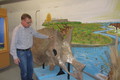 Mike Leite shows dinosaur fossil