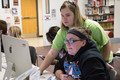 Shea Johnson assists Kristyna Parkins in graphic design