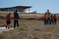 Bill Whitney leads children on a hike