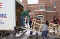 Scott Cavin loads the stage in a truck