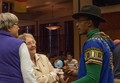 Jeff Mugingo speaks with community members