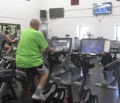 Marv Neuharth rides one of the Expresso Bike Machines in the NPAC