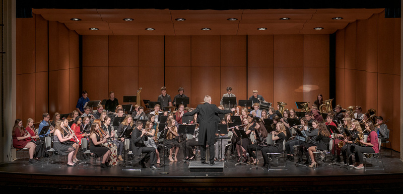 Dr. John Wojcik, associate professsor of music, directs the High Plains Honor Band during the 2019 High Plains Band & Choir Festival on February 5. (Photo by Daniel Binkard/Chadron State College)